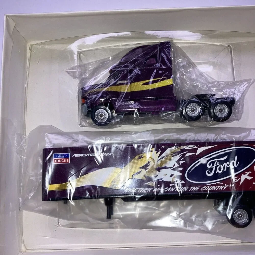 Winross 1/64 First Edition Series 1995 Ford Aeromax #4 Diecast Purple NIB